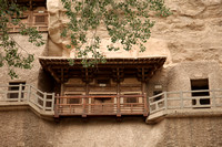 Wall painting and wooden structures over doorway